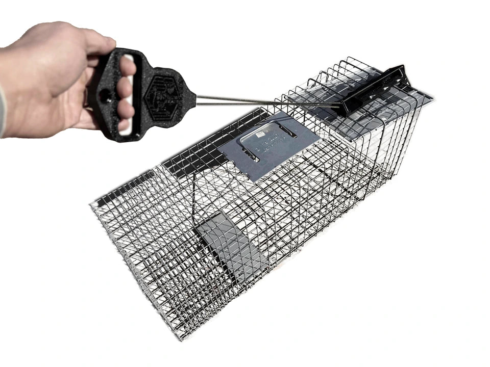 OpenTrap handle and mechanism attached to an empty cage